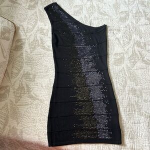 Onee shoulder, black dress with sequins design.